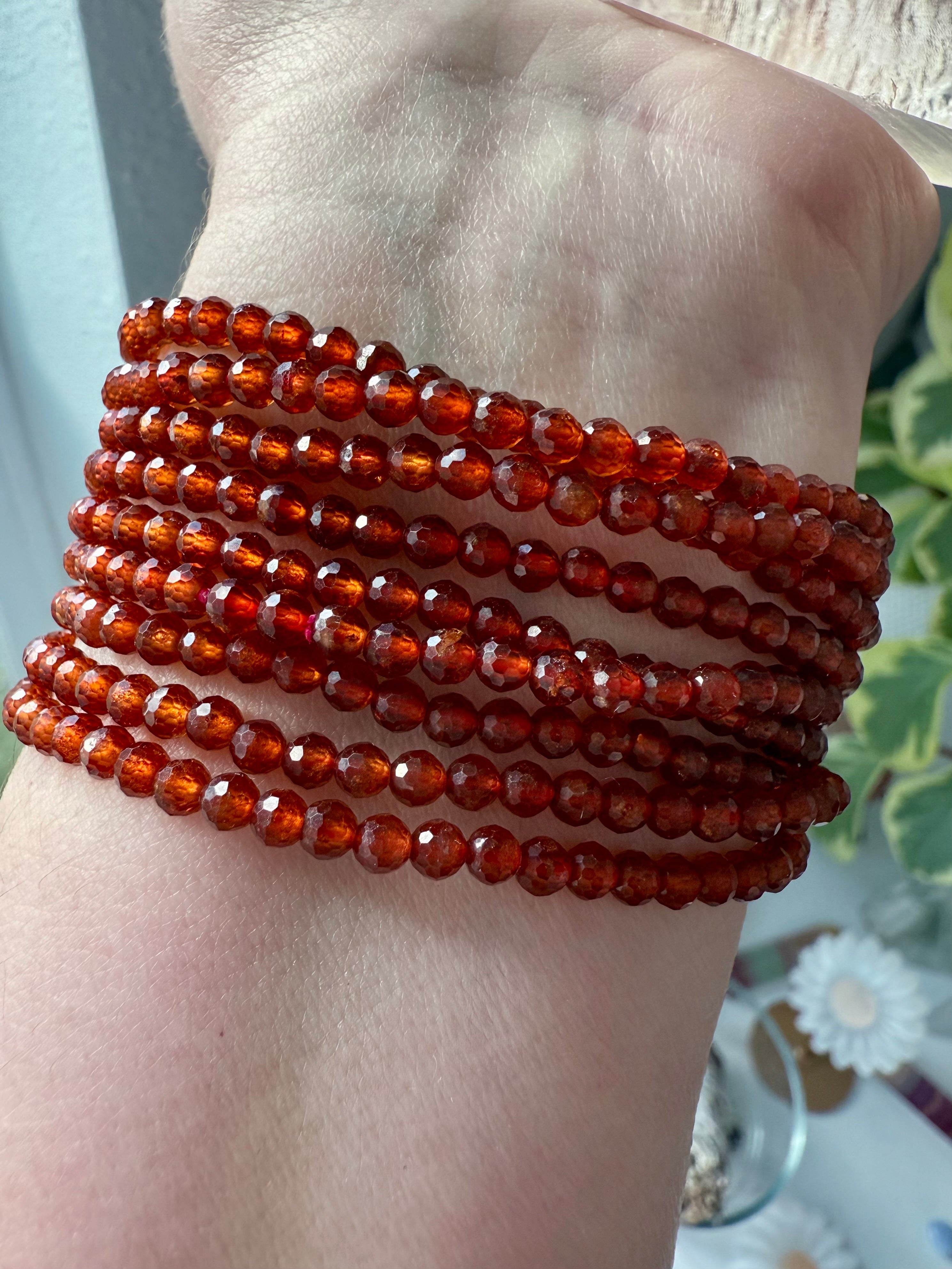 A sparkly faceted Spessartite Garnet Bracelet with lovely depth of color + gemmy transparency
