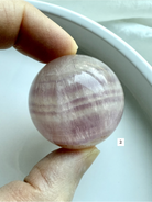 choose your own pink Fluorite sphere with silky cream and lavender striping for emotional balance and focus