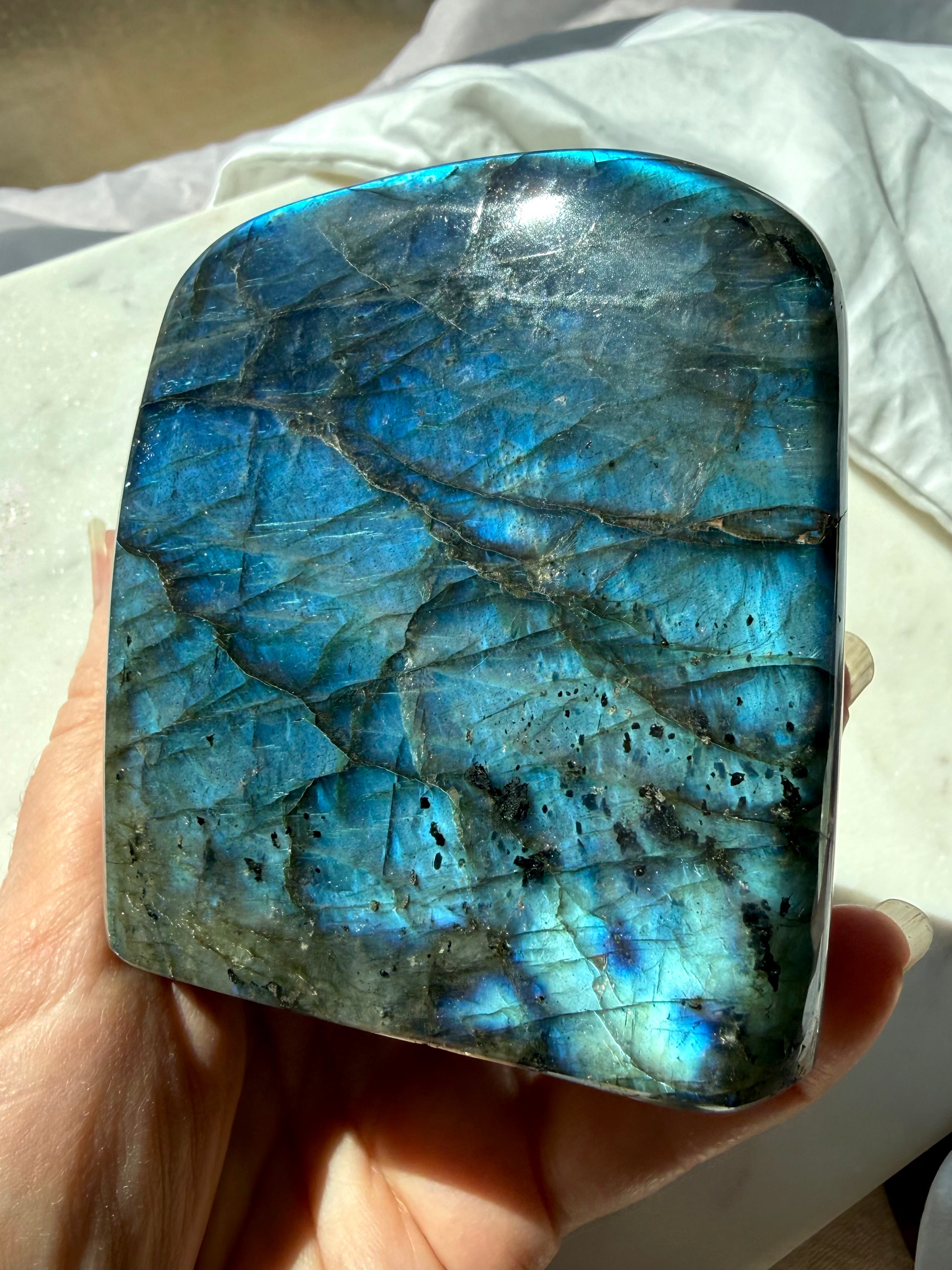 Madagascar Labradorite freeform with vivid blue flash, dark natural patterning and glossy polish