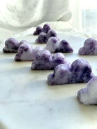 Standing Lepidolite cloud crystal carvings in soothing lilac tones for bedside decor and meditation spaces