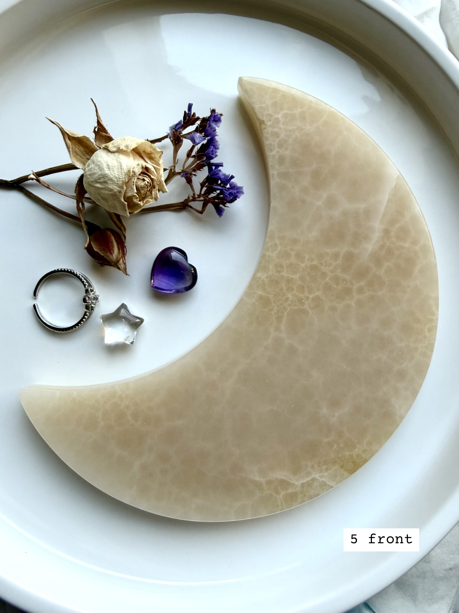 white onyx crescent moon plate # 5 front Mexican onyx crystal moon dish with warm cream and honey tones for jewelry display