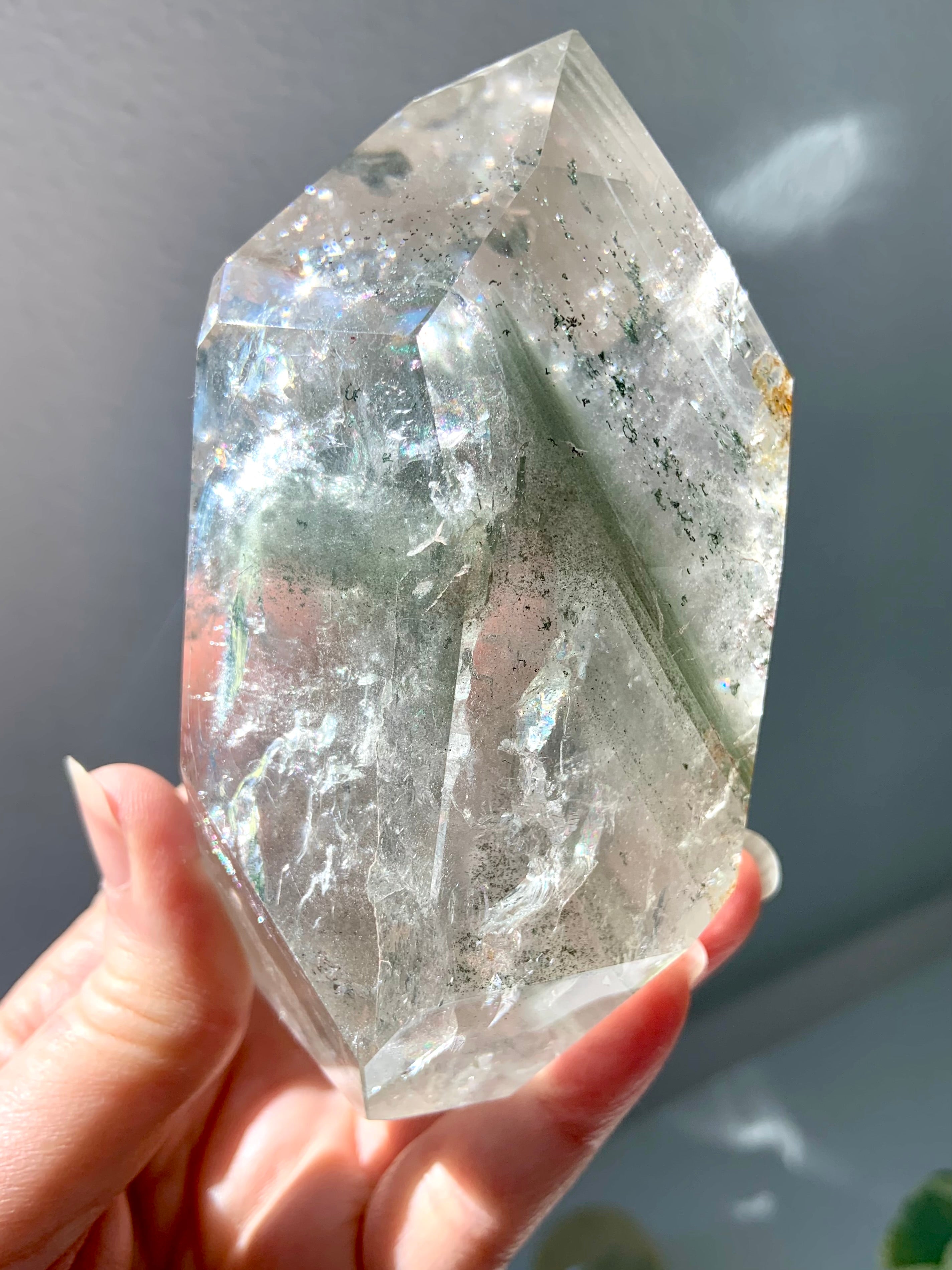 A Garden Quartz Lodolite Crystal with chlorite phantoms, mossy mineral inclusions + tons of rainbows