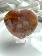 Backside of Pink Amethyst Flower Agate Heart showing soft pastel swirls and subtle druzy pockets