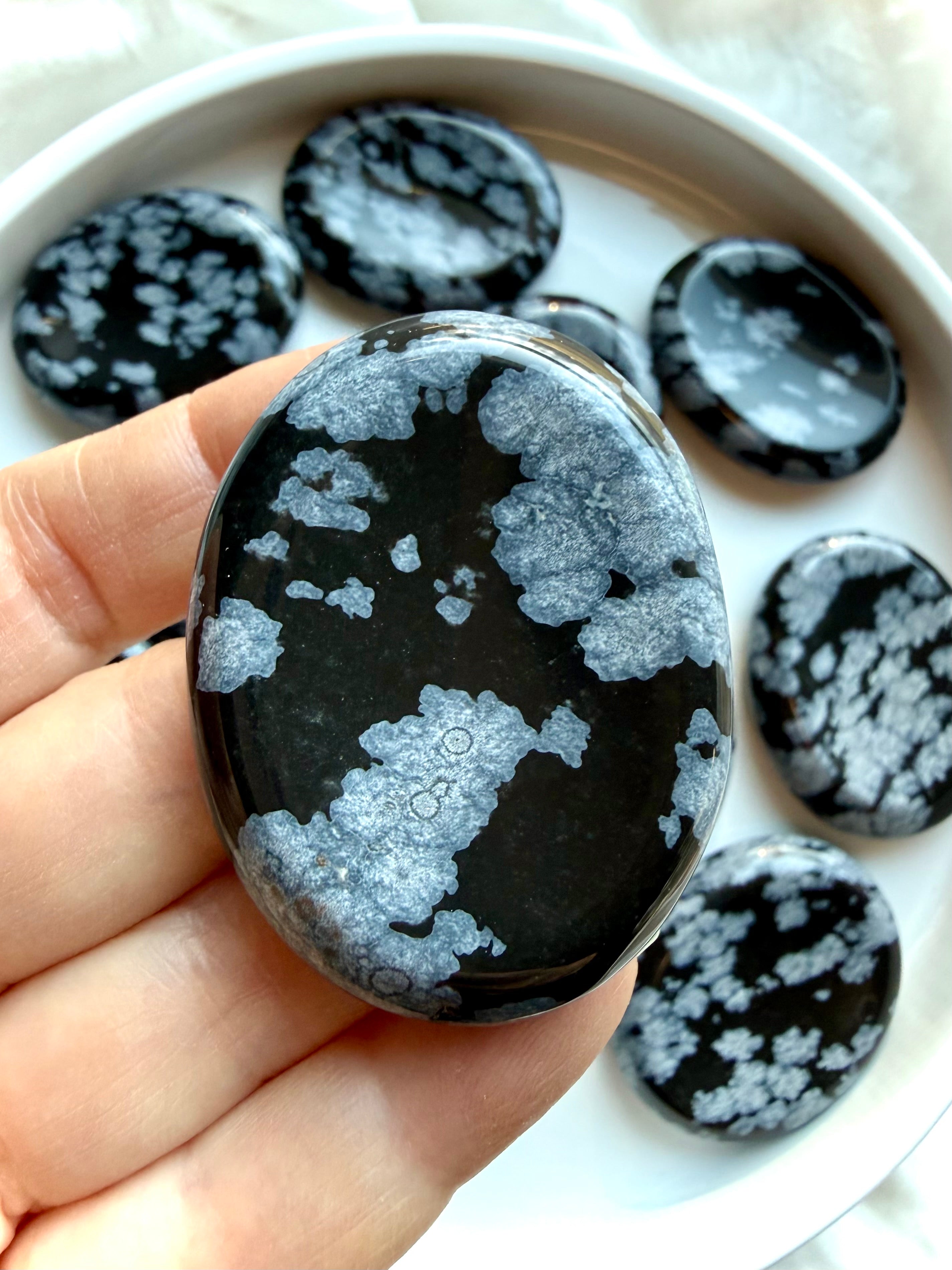 Polished Snowflake Obsidian worry stone with natural snowflake inclusions
