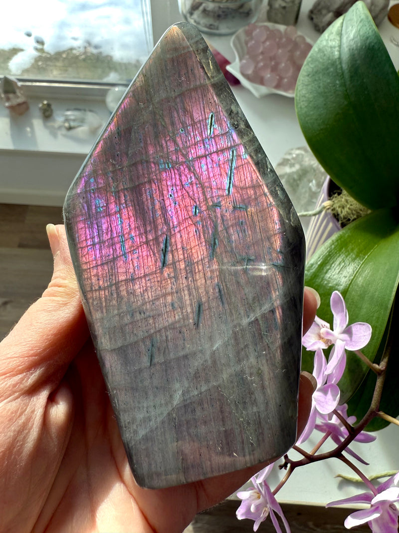 A purple flash sunset labradorite freeform tower statement piece for your crystal collection