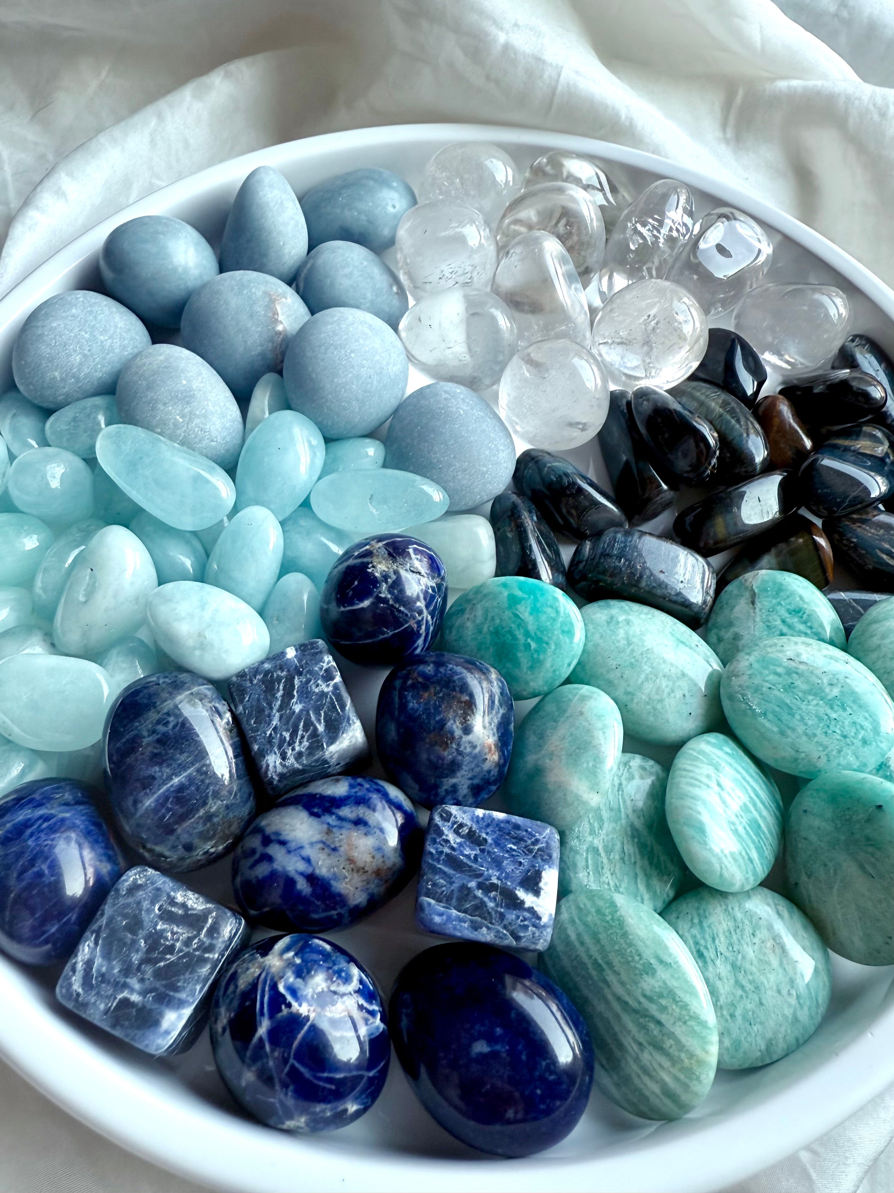 Throat Chakra Crystal Set — polished blue and clear stones for communication, creativity, and self-expression