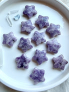 Lepidolite star crystals with mottled lavender and deep purple coloring for emotional balance, inner peace and spiritual growth