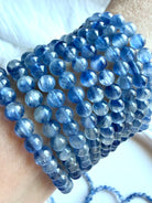 Collection of Blue Kyanite bracelets in layered shades of icy blue, cornflower, and sapphire