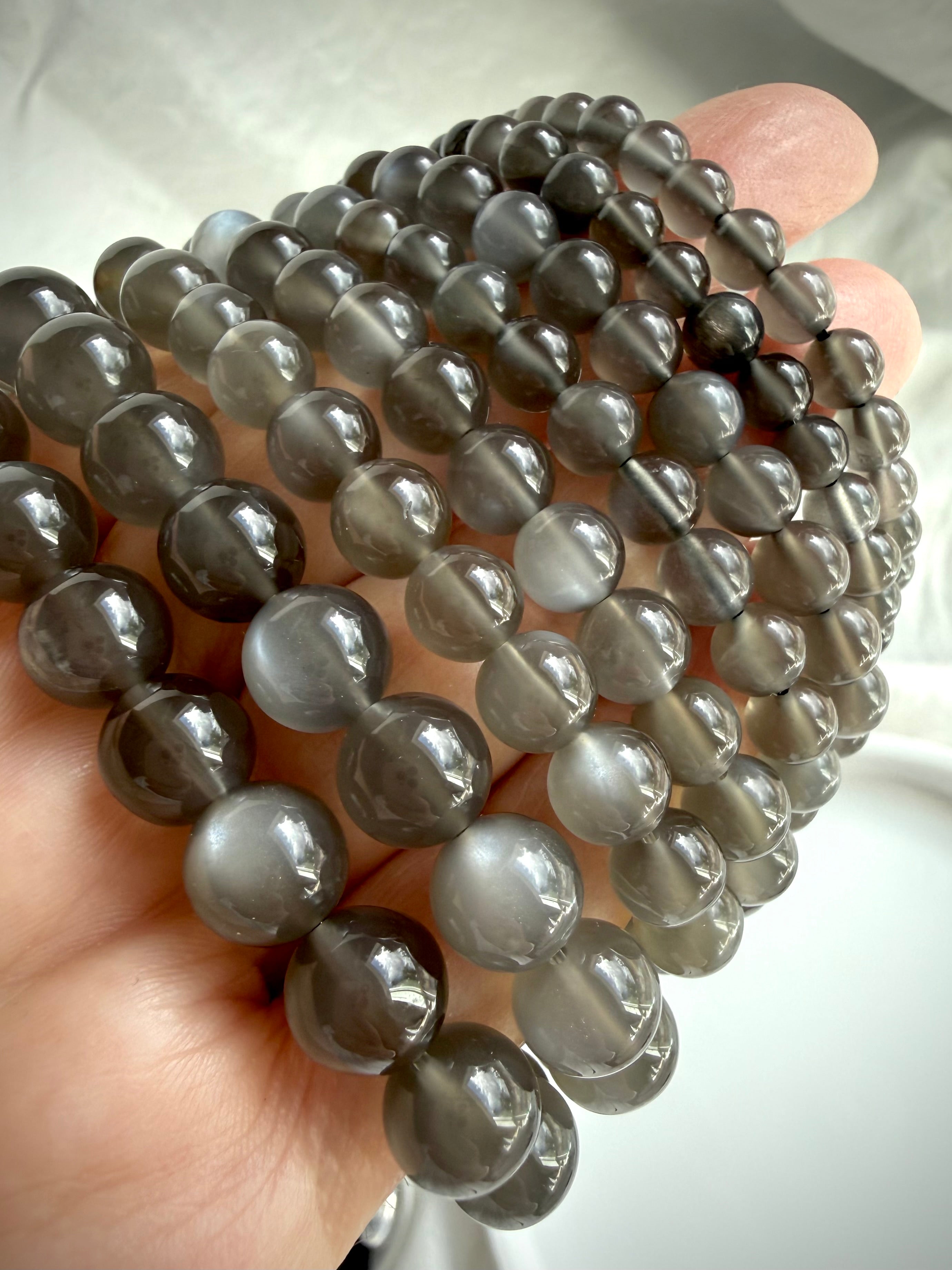 Black Moonstone bracelets with shimmering adularescence in multiple bead sizes from 5–12 mm