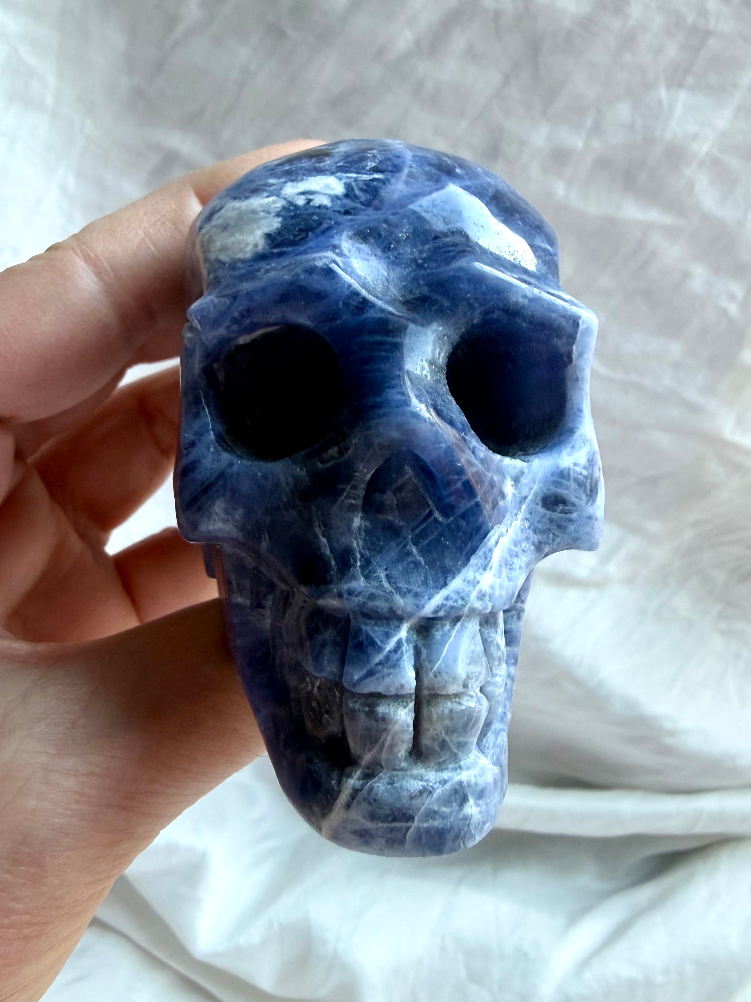 Hand carved Sodalite skull crystal for intuition, wisdom, Throat Chakra, and Third Eye Chakra work