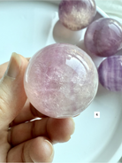 translucent Silky Magenta Fluorite sphere with soft pink and violet tones for heart and third eye chakras