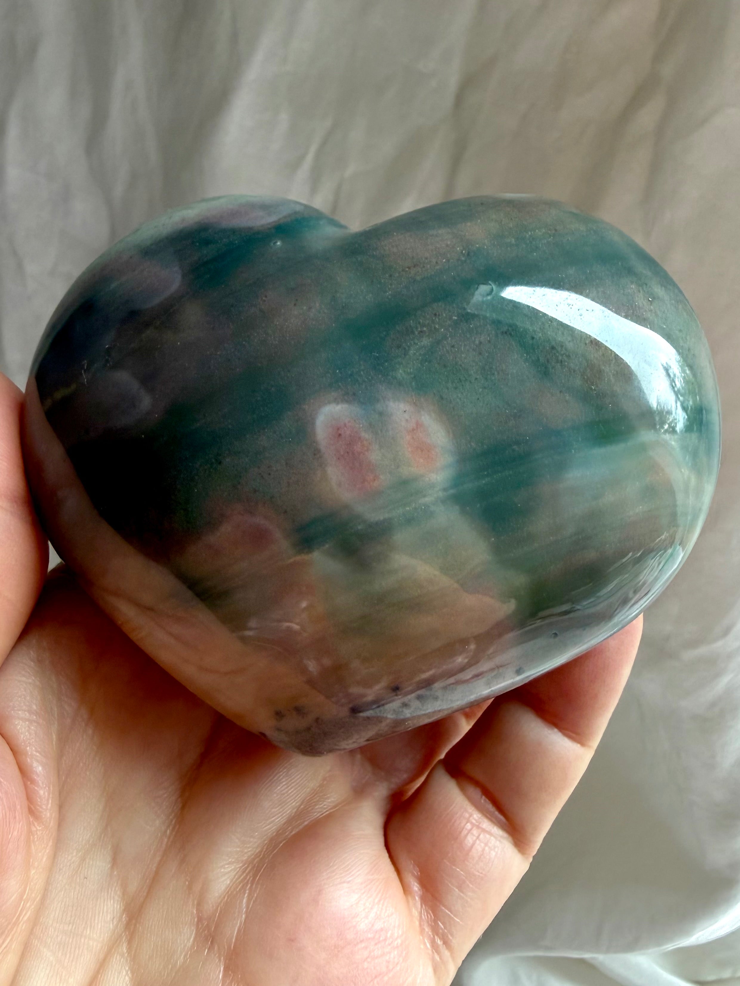 One of a kind Ocean Jasper heart from Madagascar with teal, mauve, and peach wave patterns and a glossy polished finish