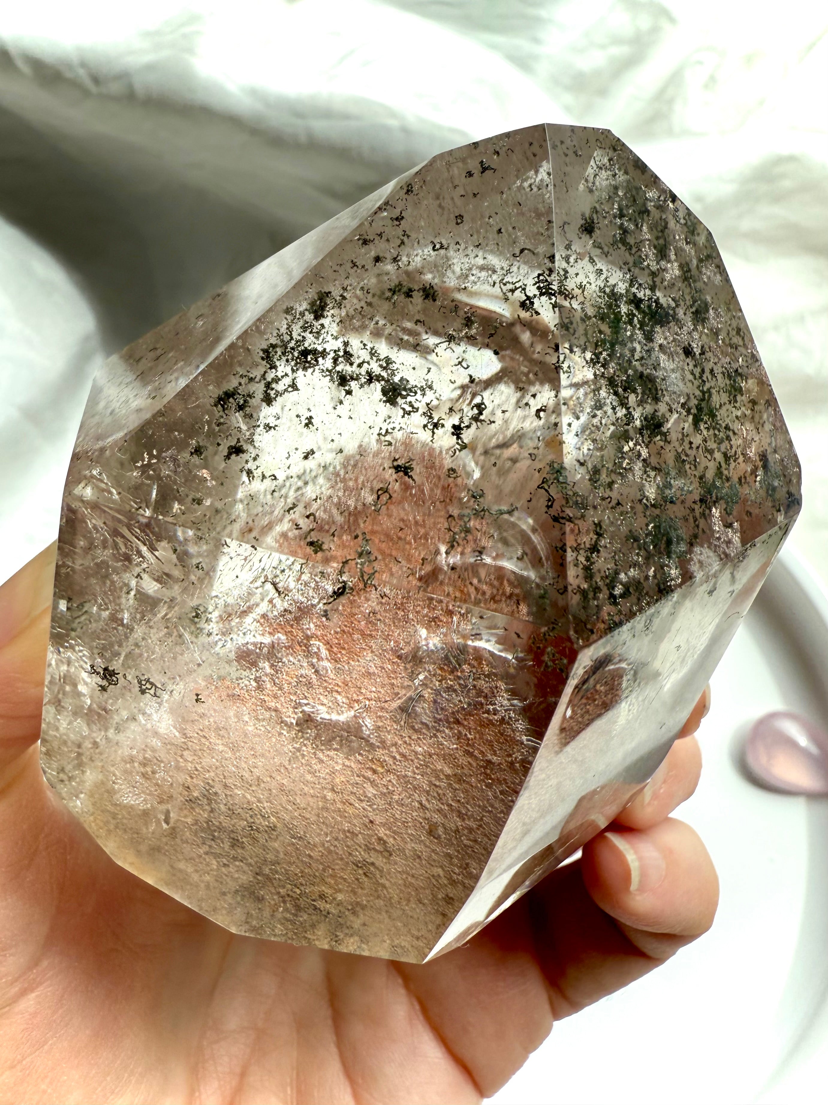 This Lodolite Garden Quartz Crystal is a Master Teacher that captures the light so beautifully