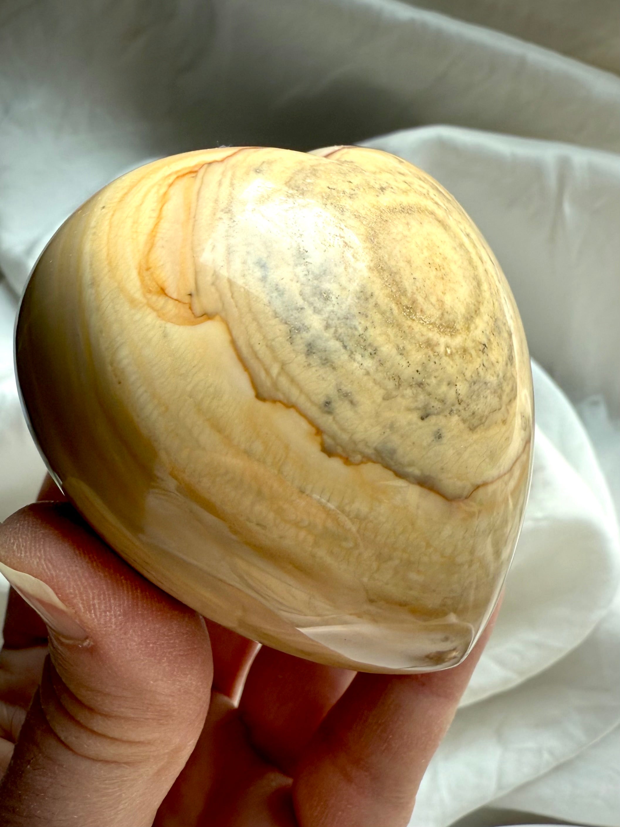 Natural Ocean Jasper heart with soft sandy beige layers and smooth polish — grounding healing crystal heart for comfort, love energy, and balance