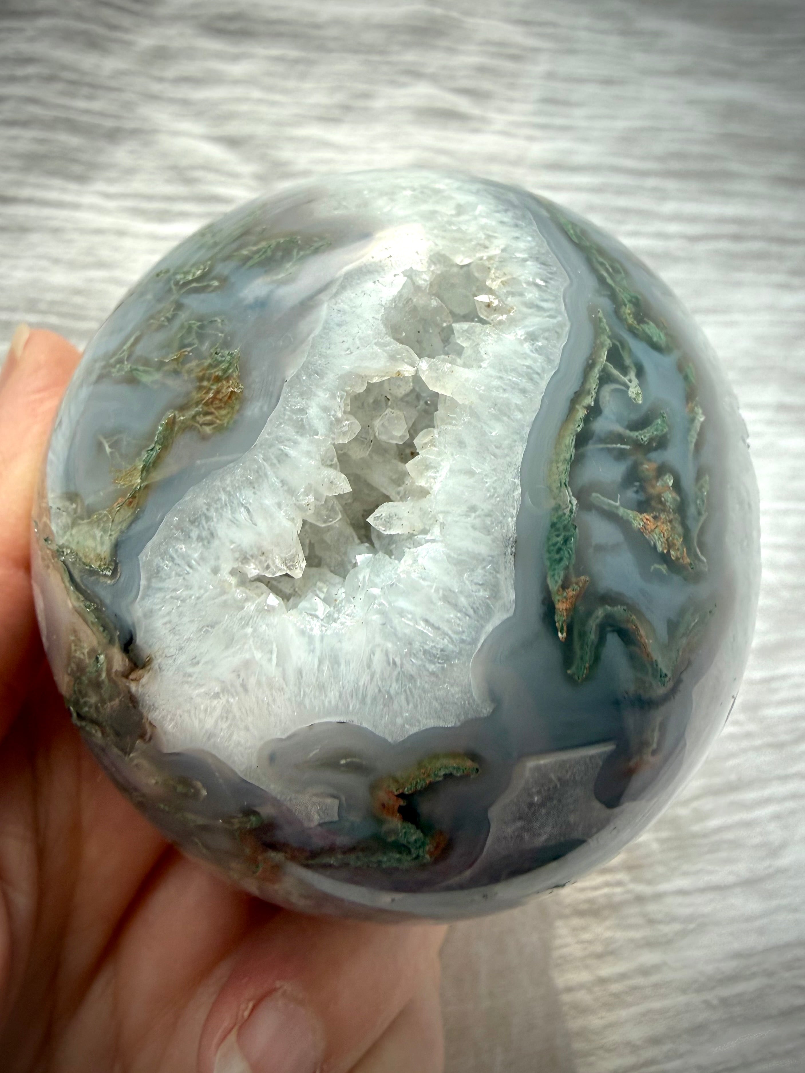 Moss Agate geode sphere with sparkling Quartz crystal cave, dendritic moss inclusions and blue-gray chalcedony banding