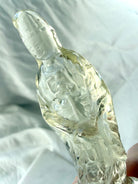 natural Citrine Quan Yin carving showing side profile and polished translucent crystal details