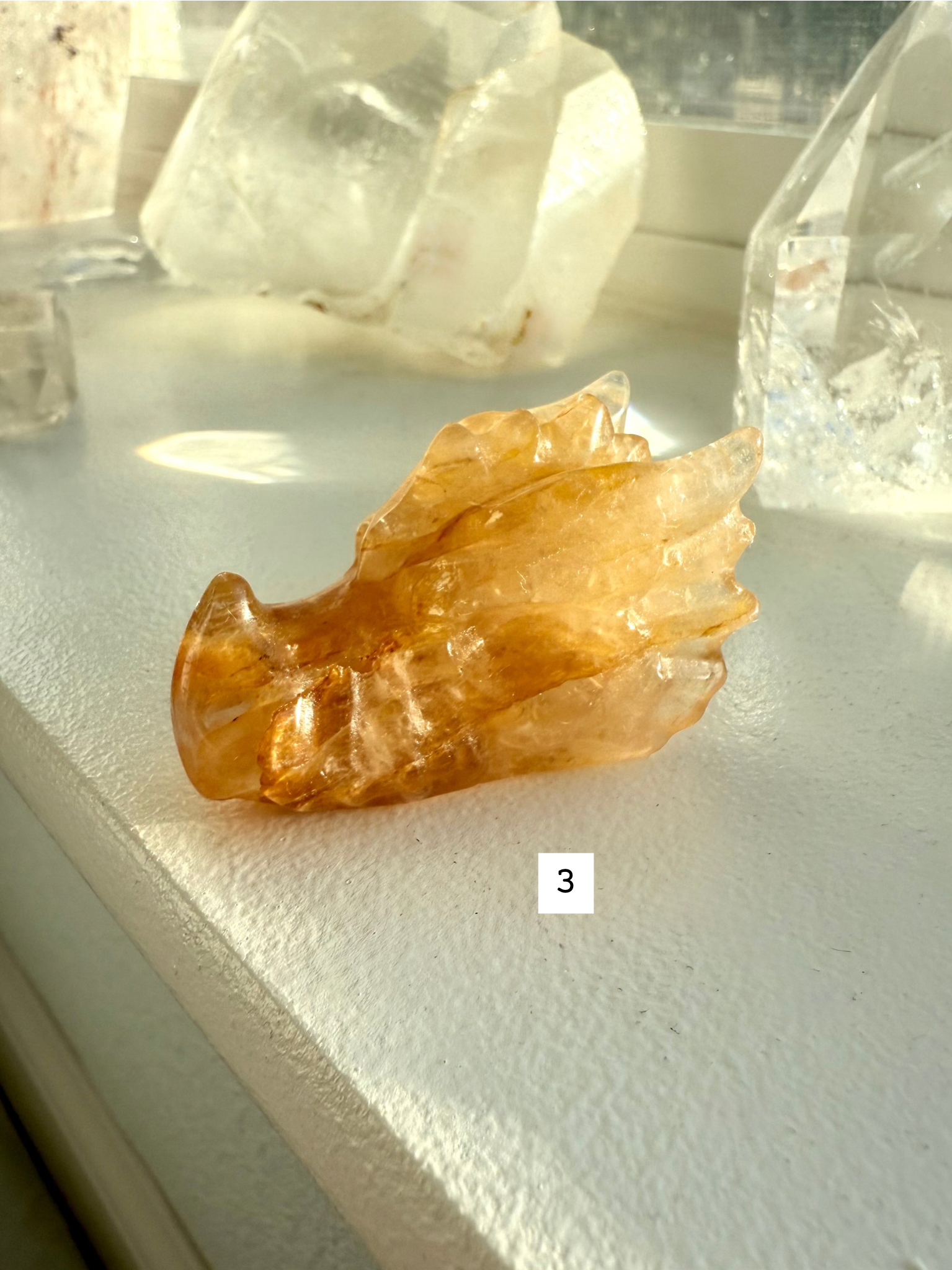 Golden Healer Quartz dragon head carving with bright honey and bronze tones — crystal carving for chakra healing, confidence, and empowerment.