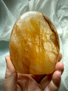 Golden Healer Quartz crystal freeform with glowing internal inclusions and rich honey gold coloration