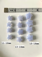 Blue Lace Agate stars arranged in 3 rows with measuring tape & sizes labeled — mini crystals for calm, clarity & self-expression.