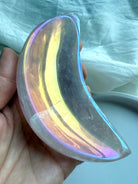 Shimmery Aura Rose Quartz crescent moon shaped bowl, showing opalescent shimmer
