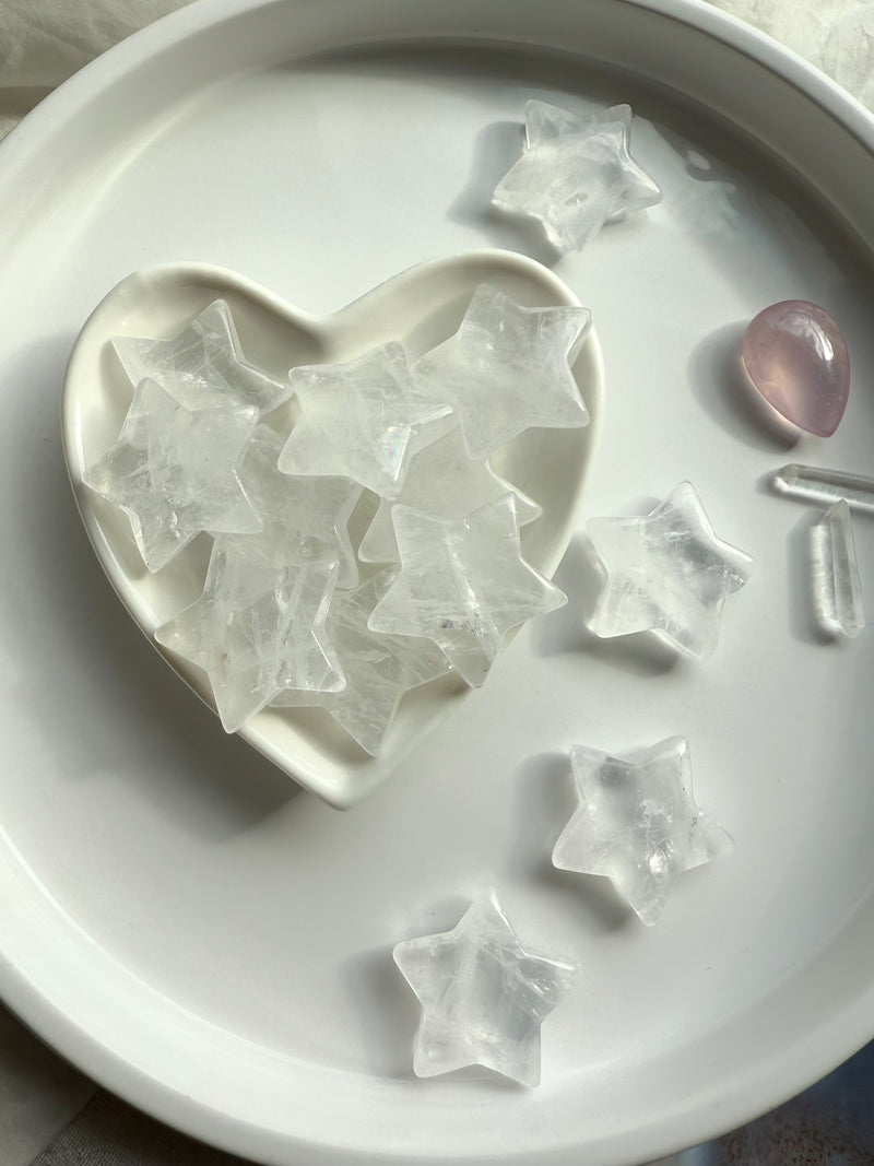 Clear quartz stars in a ceramic heart bowl 