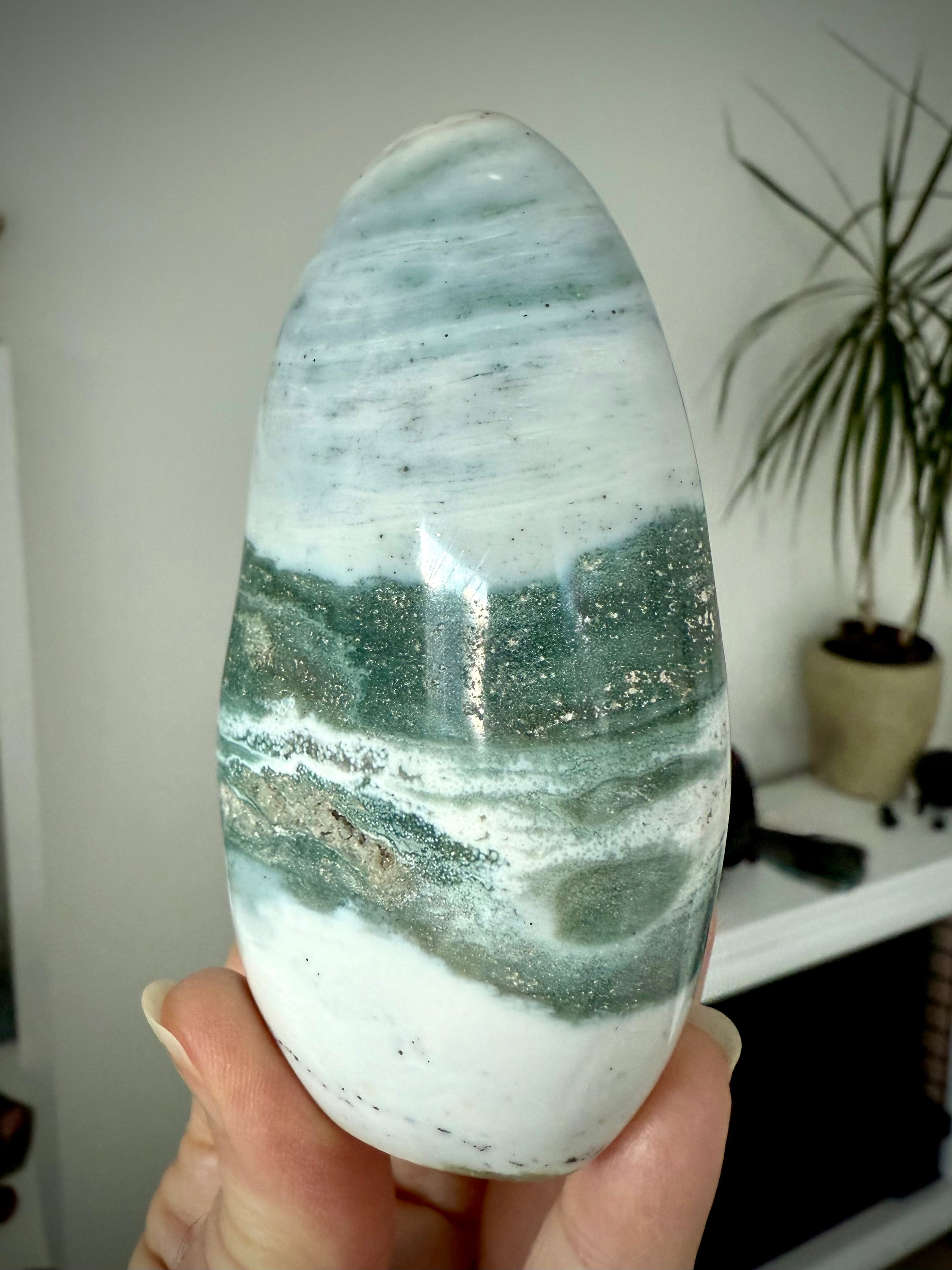 A rare Blue Ocean Jasper Freeform with druzy + swirling teal, green, bluish gray + white patterns