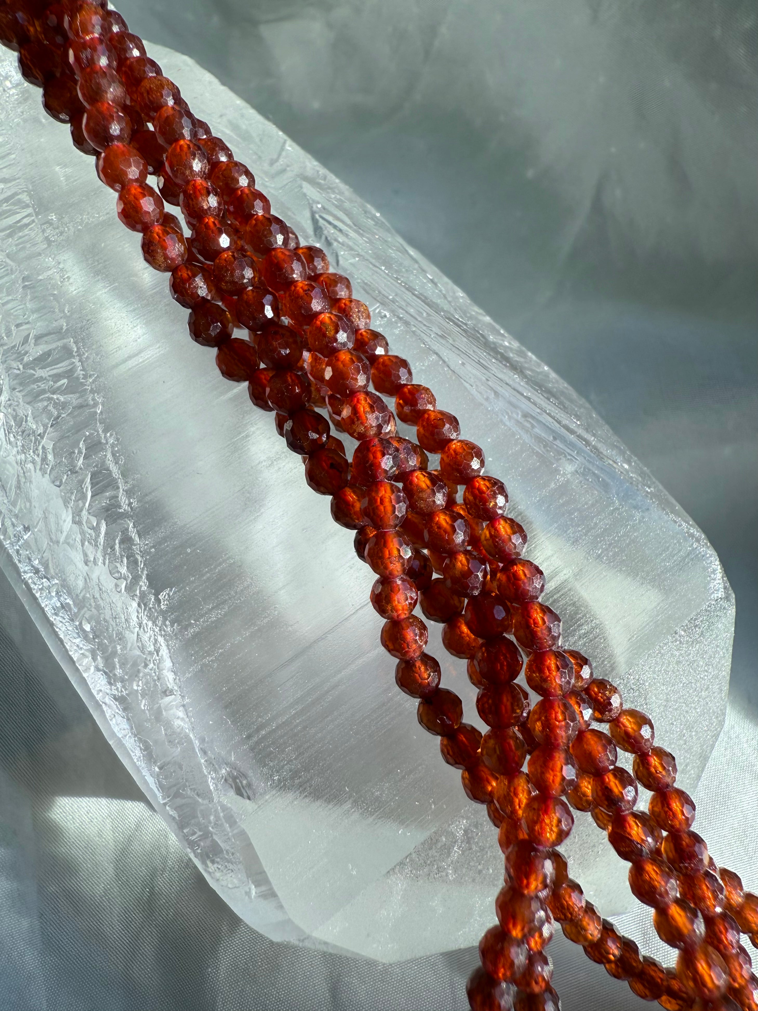 Made from sparkly faceted Spessartite Garnet beads with a vibrant orange color + gemmy transparency