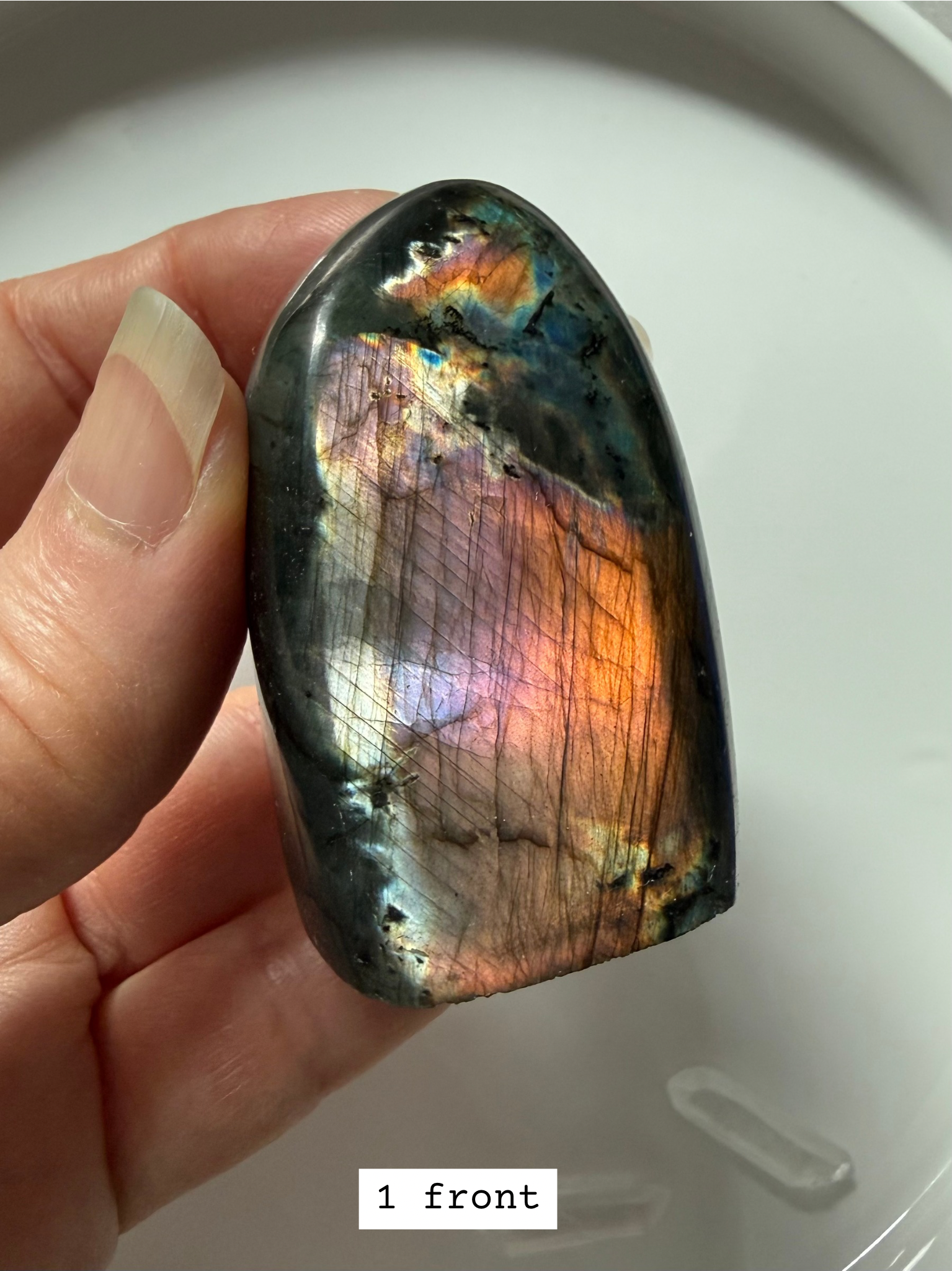 Polished labradorite freeform with pink, purple, and rainbow flash.