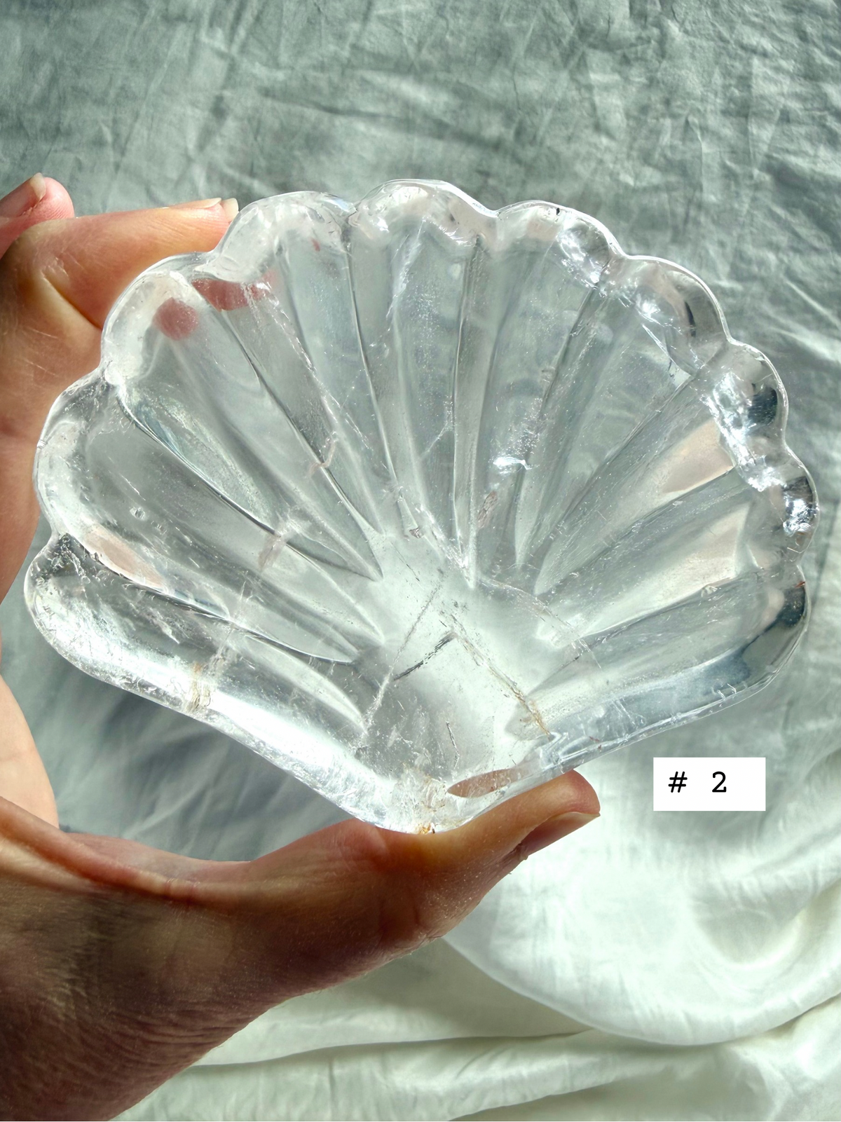 Clear Quartz shell bowl, individual piece #2, showing natural crystal patterns and polished scallop carving.