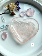 rose quartz heart bowl surrounded by polished crystal shapes, heart chakra gemstone dish for love, gentle energy, and altar styling