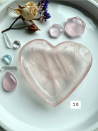 rose quartz heart bowl displayed with dried rose and crystal accents, heart chakra gemstone dish for love, compassion, and spiritual home décor