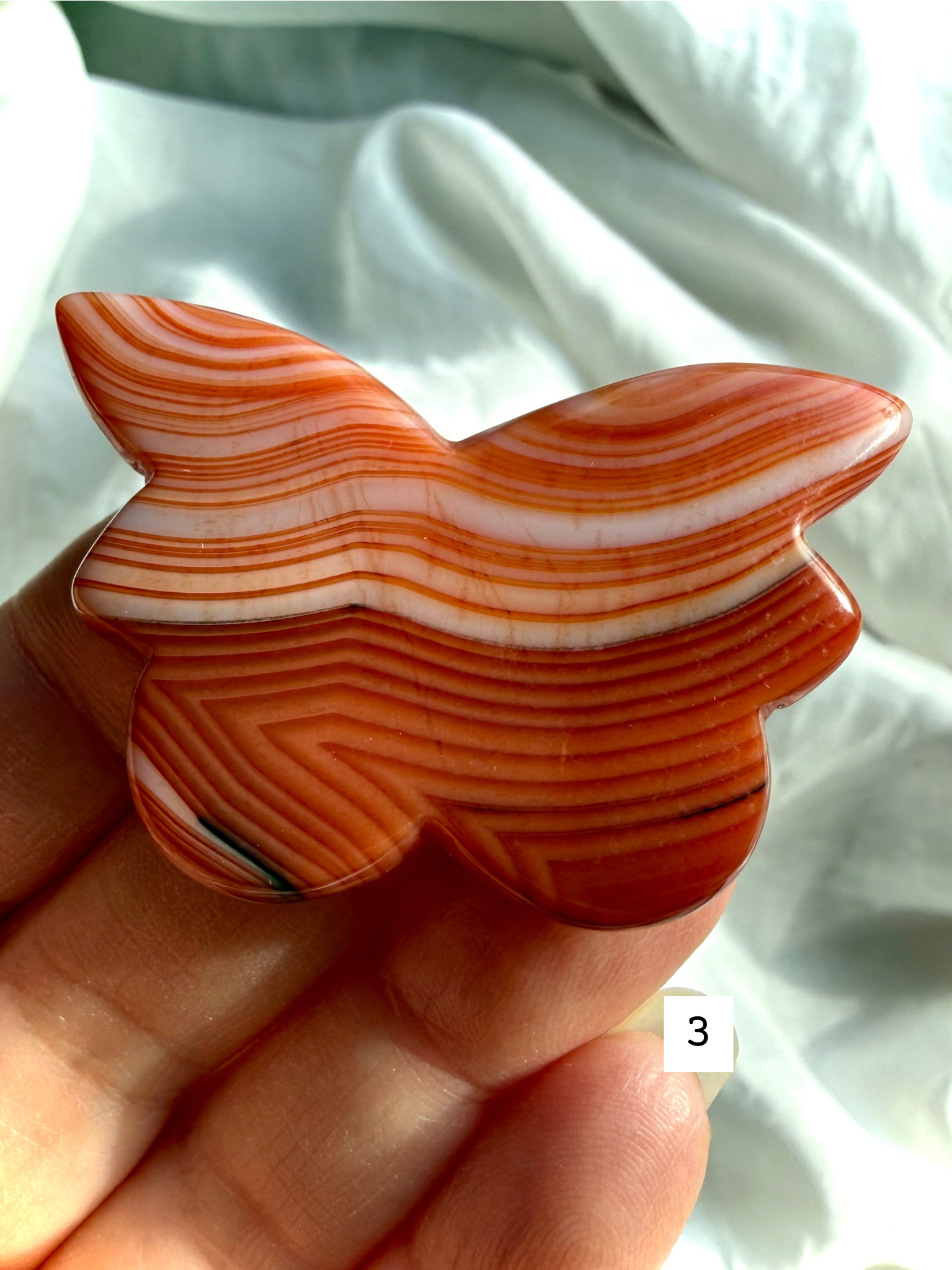 Carnelian Butterfly crystal carving number 3 with bold banded Carnelian patterns