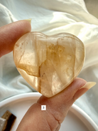 golden healer quartz heart number 2 with soft golden tones and internal veils
