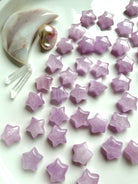 Mini Kunzite star crystals in soft pink and lavender for Divine Love, emotional healing and Heart Chakra energy