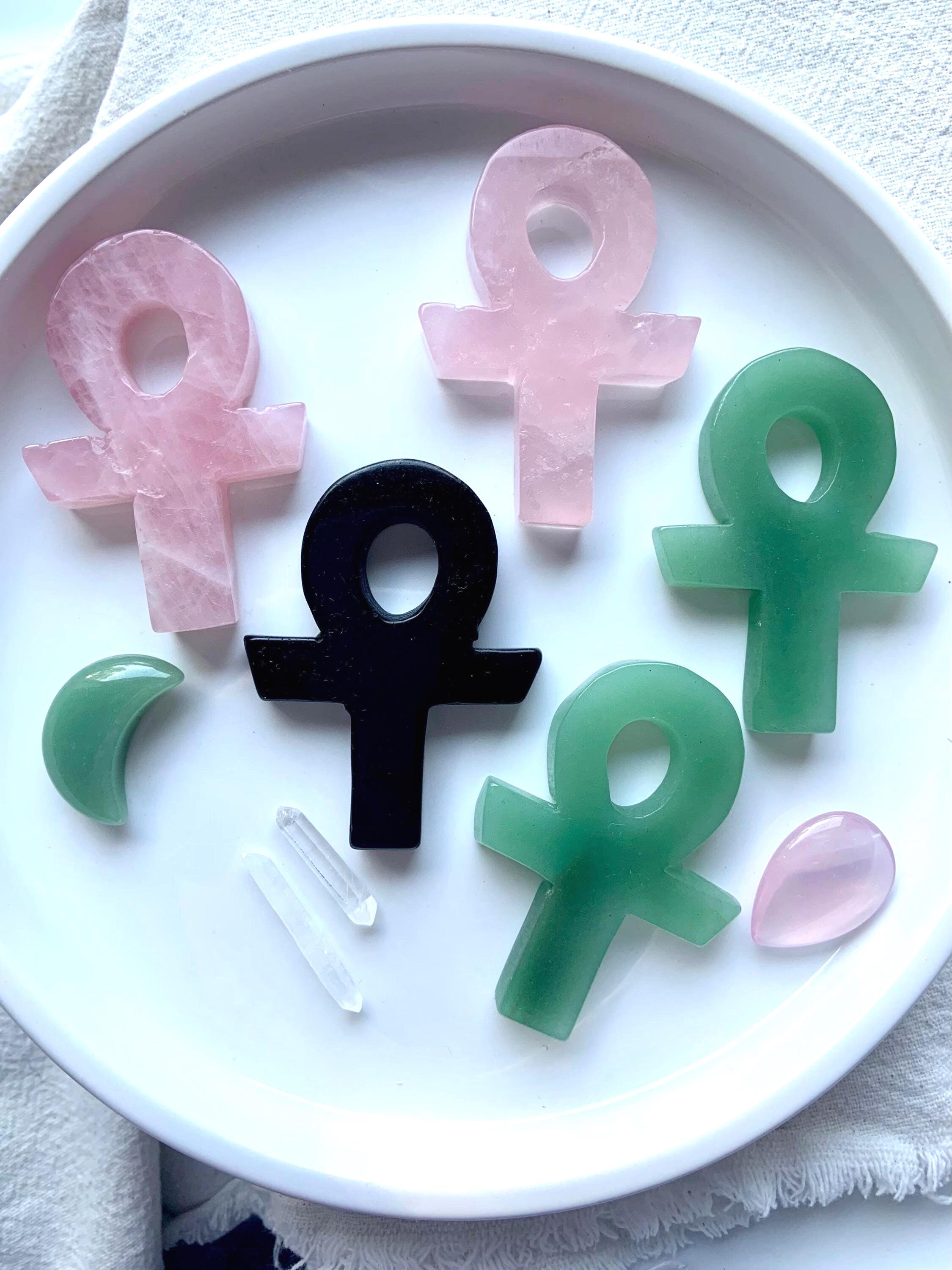 Hand Carved Crystal Ankhs available are Rose Quartz, Black Obsidian, and Green Aventurine