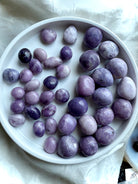 Purple lepidolite crystal tumbled stones for calm, emotional balance, and stress relief