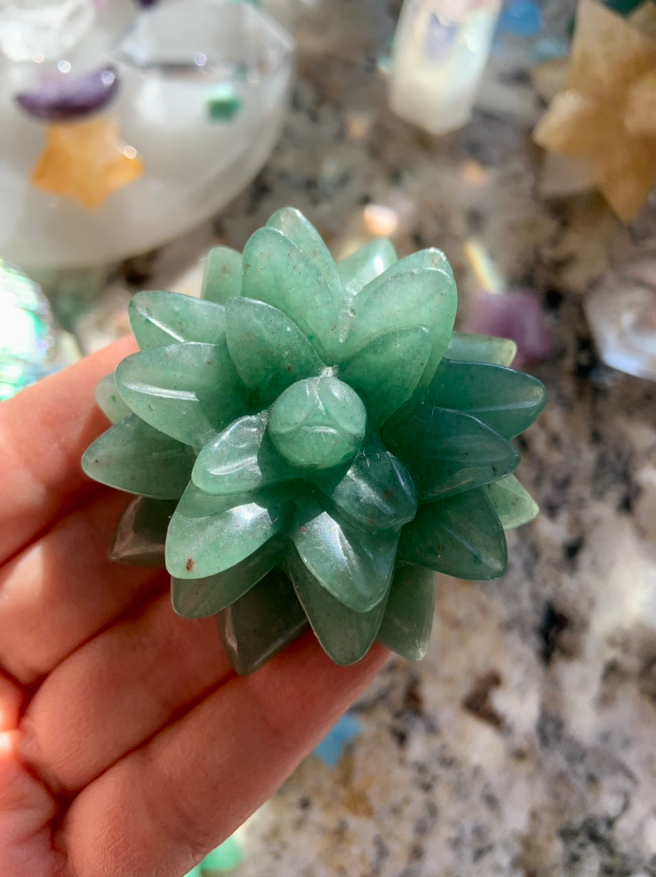 Green Aventurine succulent carving shown in hand — crystal flower for abundance, love & heart-centered intentions.