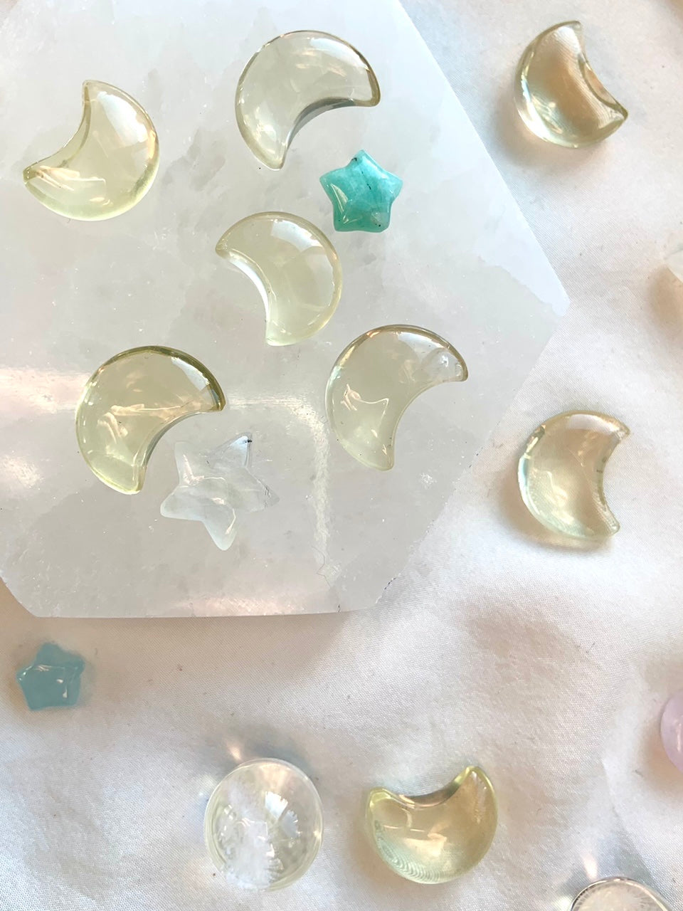 Mini citrine moon carvings on hexagonal selenite with crystal stars — citrine crystals for manifestation and solar energy alignment