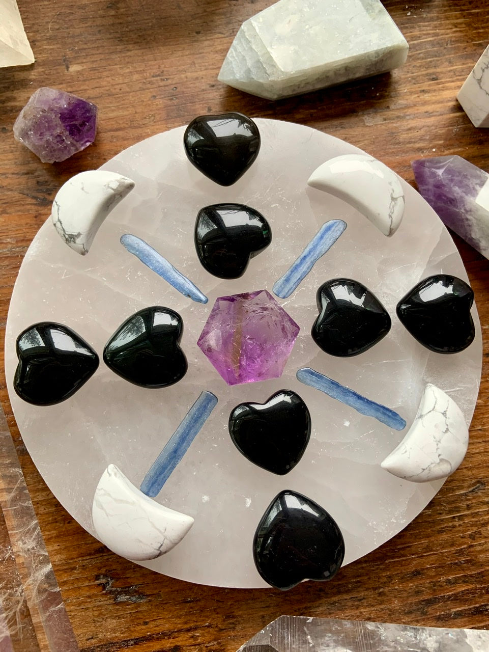 Black Obsidian Hearts in a crystal grid for energetic protection + expanded consciousness