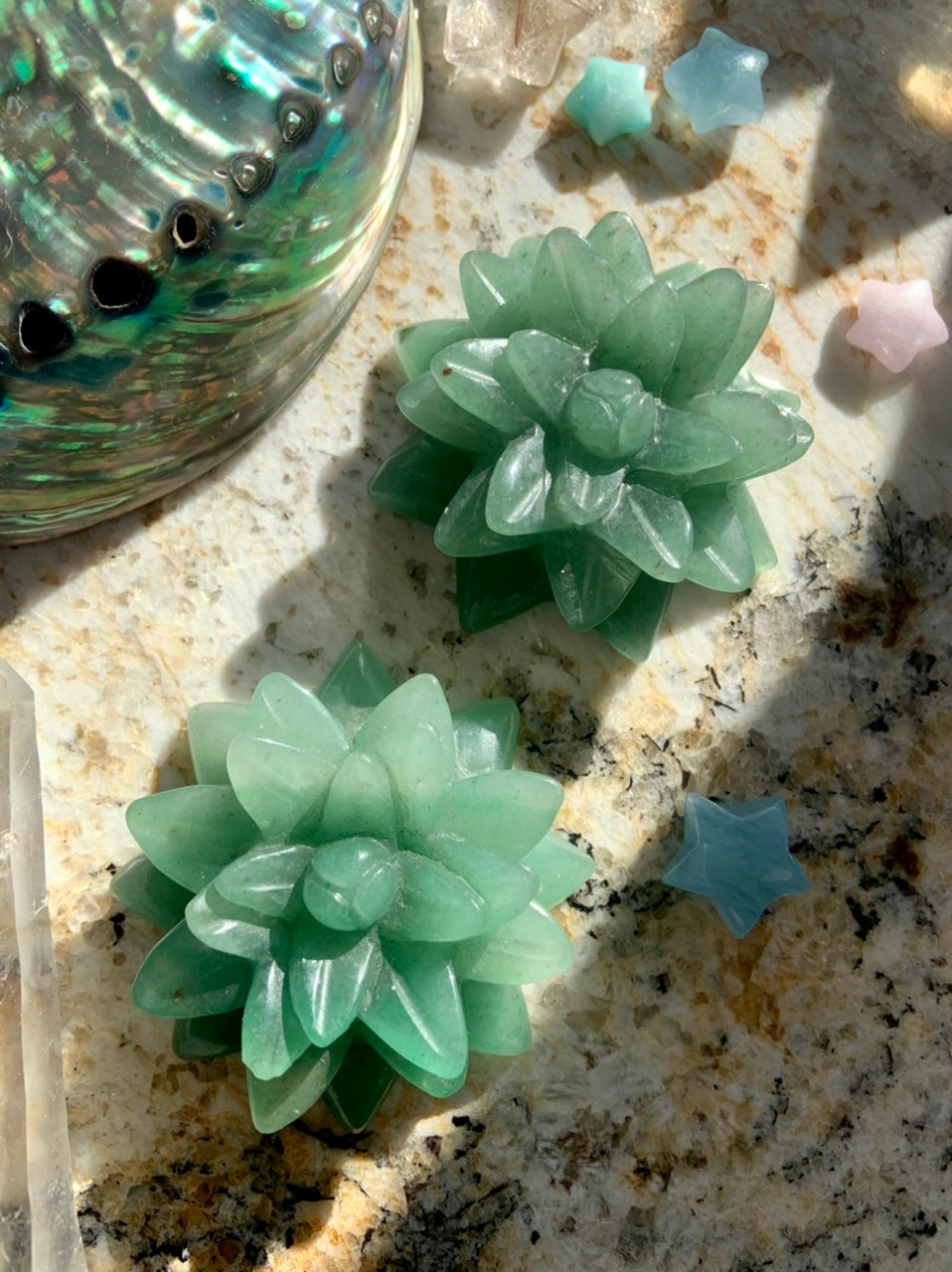 Pair of Green Aventurine succulent carvings with abalone shell & mini crystal stars — sacred space décor for joy, love & abundance.